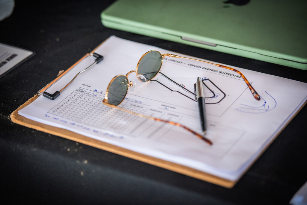 Driver debrief scoresheet used in motorsport coaching sessions